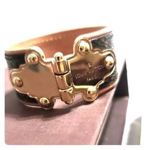 Louis Vuitton Gold/Monogram bracelet.